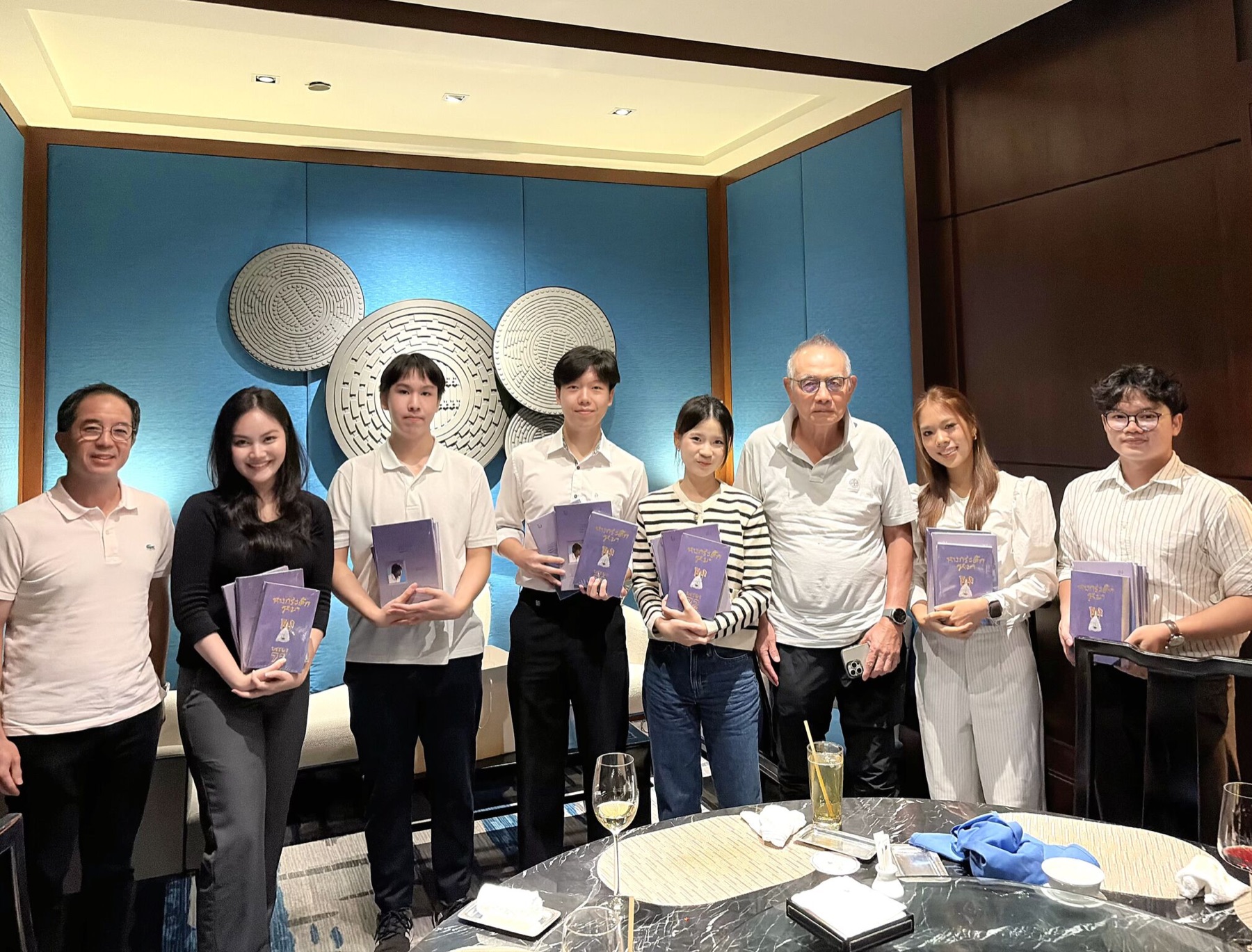 Hackathon winners receive books from Banyong Pongpanich
