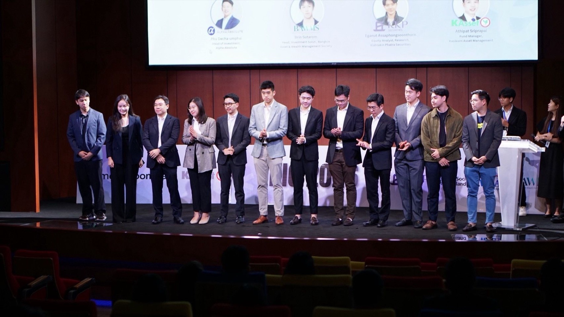THIC 2026 mentors and industry representatives stand on stage